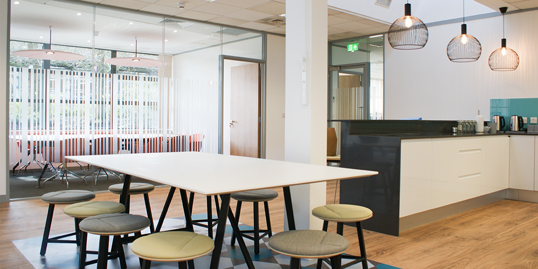 Kitchen area in office remodel by Mobius At Work