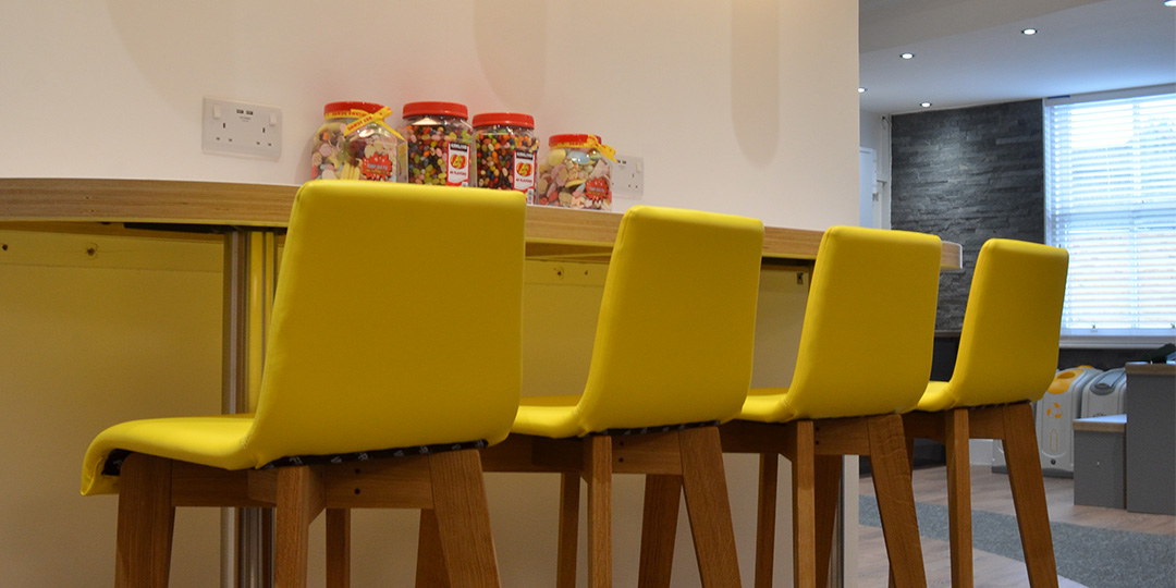 High yellow chair seating in the Big Yellow offices