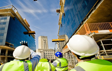 A project team looking at exterior construction work